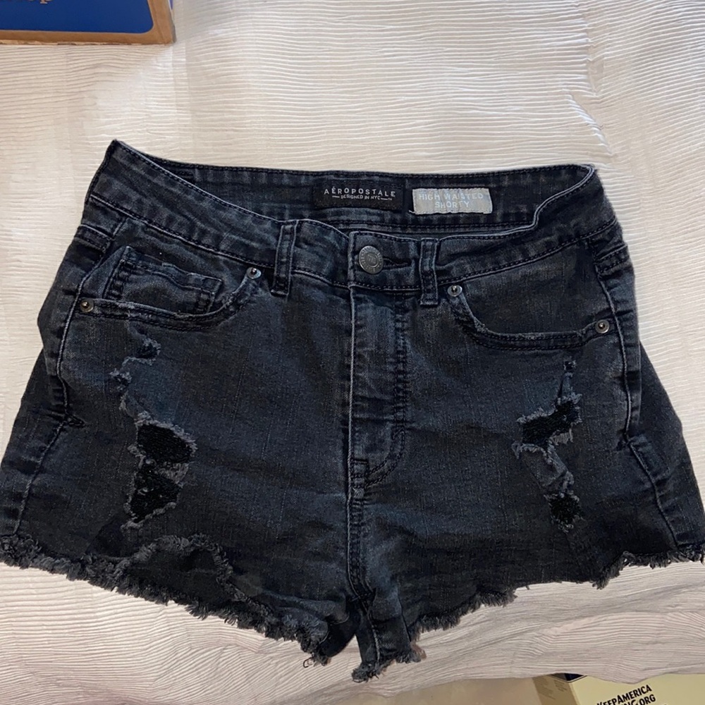 Black ripped shorts